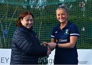13 April 2023; Sophia Cole is presented with her winners medal by Vice President of Hockey Ireland Barbara O'Malley during the UCD Ladies Hockey EYHL medal presentation event at UCD Hockey Stadium in Belfield, Dublin. Photo by Tyler Miller/Sportsfile