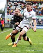 14 April 2023; Craig Gilroy of Ulster is tackled by Rio Dyer of Dragons during the United Rugby Championship match between Ulster and Dragons at the Kingspan Stadium in Belfast. Photo by John Dickson/Sportsfile