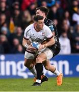 14 April 2023; Craig Gilroy of Ulster is tackled by Jared Rosser of Dragons during the United Rugby Championship match between Ulster and Dragons at the Kingspan Stadium in Belfast. Photo by Ramsey Cardy/Sportsfile