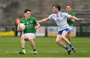 15 April 2023; Oisin Swift of Fermanagh in action against Andrew Stuart of Monaghan during the Electric Ireland Ulster GAA Football Minor Championship Round 1 match between Fermanagh and Monaghan at Brewster Park in Enniskillen, Fermanagh. Photo by Ramsey Cardy/Sportsfile