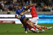 15 April 2023; Damian Willemse of DHL Stormers is tackled by Alex Kendellen and Mike Haley of Munster during the United Rugby Championship match between DHL Stormers and Munster at DHL Stadium in Cape Town, South Africa. Photo by Carl Fourie/Sportsfile