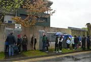 22 April 2023; Spectators wait outside the stadium before the Leinster GAA Hurling Senior Championship Round 1 match between Galway and Wexford at Pearse Stadium in Galway. Photo by Seb Daly/Sportsfile