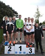 23 April 2023; Athletics Ireland Chair of Competitions Andrew Lynam, right, with master men 50+ medallists, Rathfarnham WSAF AC, Dublin, gold, Clonliffe Harriers AC, Dublin, silver, and Donore Harriers AC, Dublin, bronze, during the 123.ie National Road Relay Championships at Raheny in Dublin. Photo by Sam Barnes/Sportsfile