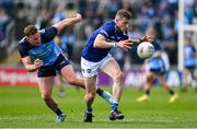 23 April 2023; Trevor Collins of Laois in action against Ciarán Kilkenny of Dublin during the Leinster GAA Football Senior Championship Quarter-Final match between Laois and Dublin at Laois Hire O'Moore Park in Portlaoise, Laois. Photo by Brendan Moran/Sportsfile