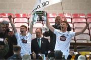 25 April 2023; Kildare joint captains Harry O'Neill, left, and James Harris lift the cup after the 2023 EirGrid Leinster U20 Football Championship Final between Dublin and Kildare at Netwatch Cullen Park, Carlow. Photo by Eóin Noonan/Sportsfile