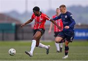 28 April 2023; Sadou Diallo of Derry City in action against Jamie Lennon of St Patrick's Athleticduring the SSE Airtricity Men's Premier Division match between Derry City and St Patrick's Athletic at The Ryan McBride Brandywell Stadium in Derry. Photo by Ramsey Cardy/Sportsfile