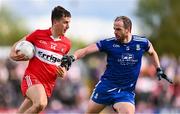 29 April 2023; Shane McGuigan of Derry in action against Conor Boyle of Monaghan during the Ulster GAA Football Senior Championship Semi Final match between Derry and Monaghan at O’Neills Healy Park in Omagh, Tyrone. Photo by Ben McShane/Sportsfile