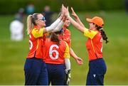 01 May 2023; Gaby Lewis, left, and Annabel Squires of Scorchers celebrate after Jamie-Lee Strang of Dragons was run out during the Evoke T20 Super Series 2023 match between Scorchers and Dragons at Malahide Cricket Club in Dublin. Photo by David Fitzgerald/Sportsfile