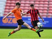 6 May 2023; Dane Mahon of Cherry Orchard FC in action against Jack Allen of St Kevin's FC during the FAI Under 17 Cup Final 2022/23 match between Cherry Orchard FC and St Kevin’s Boys FC at Richmond Park in Dublin. Photo by Tyler Miller/Sportsfile