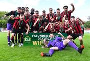 6 May 2023; Cherry Orchard FC players celebrate with the cup after their side's victory in the FAI Under 17 Cup Final 2022/23 match between Cherry Orchard FC and St Kevin’s Boys FC at Richmond Park in Dublin. Photo by Tyler Miller/Sportsfile