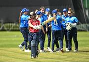 7 May 2023; Typhons celebrate as Leah Paul of Dragons loses her wicket during the Evoke Super Series 2023 match between Dragons and Typhoons at Lisburn Cricket Club, Wallace Park in Lisburn, Down. Photo by Oliver McVeigh/Sportsfile