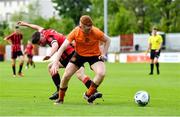 6 May 2023; Jack McDermott of St Kevin's FC in action against Dane Mahon of Cherry Orchard FC during the FAI Under 17 Cup Final 2022/23 match between Cherry Orchard FC and St Kevin’s Boys FC at Richmond Park in Dublin. Photo by Tyler Miller/Sportsfile