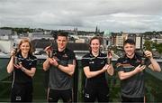 10 May 2023; PwC GAA/GPA Players of the Month for April, from left, Waterford Camogie player Beth Carton, Clare hurler John Conlon, Kerry footballer Kayleigh Cronin and Clare footballer Keelan Sexton with their awards at PwC offices in Cork. Photo by Eóin Noonan/Sportsfile