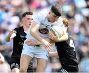 13 May 2023; Sean Hanifan of Kildare in action against Conor Johnston, left, and Luke Casserly of Sligo during the Eirgrid GAA Football All-Ireland U20 Championship Final between Kildare and Sligo at Kingspan Breffni in Cavan. Photo by Stephen McCarthy/Sportsfile