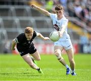 13 May 2023; Oisin O'Sullivan of Kildare in action against Luke Casserly of Sligo during the Eirgrid GAA Football All-Ireland U20 Championship Final between Kildare and Sligo at Kingspan Breffni in Cavan. Photo by Stephen McCarthy/Sportsfile