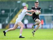 13 May 2023; Dylan Walsh of Sligo in action against Colm Dalton of Kildare during the Eirgrid GAA Football All-Ireland U20 Championship Final between Kildare and Sligo at Kingspan Breffni in Cavan. Photo by Stephen McCarthy/Sportsfile