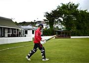 15 May 2023; Murray Commins of Munster Reds makes his way out to bat during the Cricket Ireland Inter-Provincial Series match between Munster Reds and North West Warriors at The Mardyke in Cork. Photo by Eóin Noonan/Sportsfile