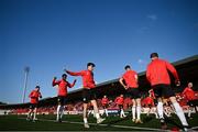 15 May 2023; Derry City players warm-up before the SSE Airtricity Men's Premier Division match between Derry City and Dundalk at The Ryan McBride Brandywell Stadium in Derry. Photo by Ramsey Cardy/Sportsfile