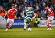 15 May 2023; Jack Byrne of Shamrock Rovers in action against Sam Curtis of St Patrick's Athletic during the SSE Airtricity Men's Premier Division match between Shamrock Rovers and St Patrick's Athletic at Tallaght Stadium in Dublin. Photo by Tyler Miller/Sportsfile