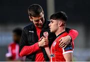 15 May 2023; Adam O'Reilly of Derry City is congratulated by Patrick McEleney, right, after the SSE Airtricity Men's Premier Division match between Derry City and Dundalk at The Ryan McBride Brandywell Stadium in Derry. Photo by Ramsey Cardy/Sportsfile