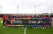 19 May 2023; St Patrick's Athletic players hold an LGBT Ireland banner, a part of SSE Airtricity's LGBT Ireland Football takeover initiative, before the SSE Airtricity Men's Premier Division match between Shelbourne and St Patrick's Athletic at Tolka Park in Dublin. Photo by Stephen McCarthy/Sportsfile