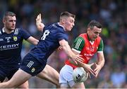 20 May 2023; Jason Doherty of Mayo is tackled by Diarmuid O'Connor of Kerry during the GAA Football All-Ireland Senior Championship Round 1 match between Kerry and Mayo at Fitzgerald Stadium in Killarney, Kerry. Photo by Piaras Ó Mídheach/Sportsfile