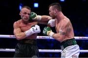 20 May 2023; Dennis Hogan, right, and James Metcalf during their IBO world super-welterweight title fight at the 3Arena in Dublin. Photo by Stephen McCarthy/Sportsfile