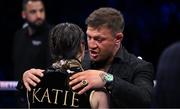 20 May 2023; Katie Taylor is consoled by UFC fighter Conor McGregor after her defeat to Chantelle Cameron in their undisputed super lightweight championship fight at the 3Arena in Dublin. Photo by Stephen McCarthy/Sportsfile