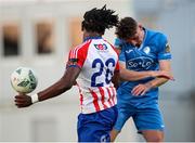 26 May 2023; Shane McMonagle of Finn Harps in action against Darren Nwankwo of Treaty United during the SSE Airtricity Men's First Division match between Treaty United and Finn Harps at Markets Field in Limerick. Photo by Michael P Ryan/Sportsfile