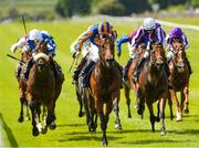 27 May 2023; Paddington, centre, with Ryan Moore up, on the way to winning Tattersalls Irish 2000 Guineas G1 during the Tattersalls Irish Guineas Festival at The Curragh Racecourse in Kildare. Photo by Matt Browne/Sportsfile