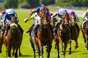 27 May 2023; Paddington, centre, with Ryan Moore up, on the way to winning Tattersalls Irish 2000 Guineas G1 during the Tattersalls Irish Guineas Festival at The Curragh Racecourse in Kildare. Photo by Matt Browne/Sportsfile