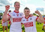 27 May 2023; Cork players Ruairi Deane, left, and Sean Powter celebrate after their side's victory in the GAA Football All-Ireland Senior Championship Round 1 match between Louth and Cork at Páirc Tailteann in Navan, Meath. Photo by Seb Daly/Sportsfile