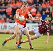 27 May 2023; Rian O'Neill of Armagh in action against James Dolan and Kevin Maguire of Westmeath during the GAA Football All-Ireland Senior Championship Round 1 match between Armagh and Westmeath at the BOX-IT Athletic Grounds in Armagh. Photo by Oliver McVeigh/Sportsfile