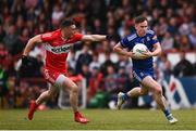 27 May 2023; Karl O Connell of Monaghan in action against Gareth McKinless of Derry during the GAA Football All-Ireland Senior Championship Round 1 match between Derry and Monaghan at Celtic Park in Derry. Photo by Harry Murphy/Sportsfile