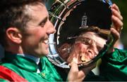 28 May 2023; Chris Hayes celebrates with the plate after winning the Tattersalls Irish 1,000 Guineas on Tahiyra during the Tattersalls Irish Guineas Festival at The Curragh Racecourse in Kildare. Photo by David Fitzgerald/Sportsfile