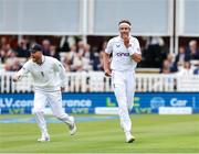 1 June 2023; Stuart Broad of England, left, celebrates with with his captain Ben Stokes after taking the wicket of Harry Tector of Ireland during day one of the Test Match between England and Ireland at Lords Cricket Ground in London, England. Photo by Matt Impey/Sportsfile