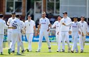 1 June 2023; England players celebrate after Stuart Broad, centre, took the wicket of James McCollum of Ireland during day one of the Test Match between England and Ireland at Lords Cricket Ground in London, England. Photo by Matt Impey/Sportsfile