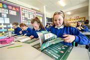 7 June 2023; Pupils, from right, Lucy Morgan, Grace McMahon, Ellie Heffernan and Una O'Brien during the launch of the Republic of Ireland women's FIFA Women's World Cup school activity book with Republic of Ireland manager Vera Pauw at St Patrick's National School in Corduff, Dublin. Photo by Stephen McCarthy/Sportsfile