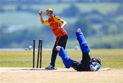 5 June 2023; Aimee Maguire of Scorchers runs out Sinead Thompson of Typhoons during the Evoke Super Series 2023 match between Scorchers and Typhoons at Oak Hill Cricket Club in Kilbride, Wicklow. Photo by Tyler Miller/Sportsfile