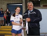 10 June 2023; Wicklow captain Danielle Shannon receives the trophy from Robbie Smyth, Munster LFGA President following the 2023 All-Ireland U14 Bronze Final match between Clare and Wicklow at McDonagh Park in Nenagh, Tipperary. Photo by Michael P Ryan/Sportsfile
