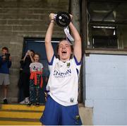 10 June 2023; Wicklow captain Danielle Shannon lifts the trophy after the 2023 All-Ireland U14 Bronze Final match between Clare and Wicklow at McDonagh Park in Nenagh, Tipperary. Photo by Michael P Ryan/Sportsfile