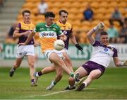 10 June 2023; Ruairi McNamee of Offaly has a shot at goal saved by Darragh Brooks of Wexford resulting in a penalty kick being awarded during the Tailteann Cup Preliminary Quarter Final match between Offaly and Wexford at Glenisk O'Connor Park in Tullamore, Offaly. Photo by Tom Beary/Sportsfile