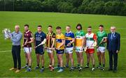 13 June 2023; At the 2023 GAA Hurling All-Ireland Series national launch at the De La Salle GAA club in Waterford are, from left, Business sales channels manager at Bord Gáis Energy John Phelan, Padraic Mannion of Galway, Seán Brennan of Dublin, Richie Reid of Kilkenny, Adam Hogan of Clare, Noel McGrath of Tipperary, Ben Conneely of Offaly, Brian Tracey of Carlow and Cathal O’Neill of Limerick and Uachtarán Chumann Lúthchleas Gael Larry McCarthy. Photo by Brendan Moran/Sportsfile