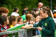 16 June 2023; Goalkeeper Grace Moloney with supporters during a Republic of Ireland women open training session at UCD Bowl in Dublin. Photo by Ramsey Cardy/Sportsfile