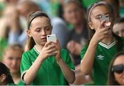 16 June 2023; Supporters during a Republic of Ireland women open training session at UCD Bowl in Dublin. Photo by Ramsey Cardy/Sportsfile