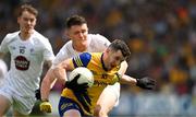 18 June 2023; \in action against \during the GAA Football All-Ireland Senior Championship Round 3 match between Roscommon and Kildare at Glenisk O'Connor Park in Tullamore, Offaly. Photo by Daire Brennan/Sportsfile