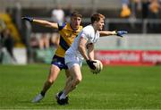 18 June 2023; Tony Archbold of Kildare in action against Daire Cregg of Roscommon during the GAA Football All-Ireland Senior Championship Round 3 match between Roscommon and Kildare at Glenisk O'Connor Park in Tullamore, Offaly. Photo by Daire Brennan/Sportsfile