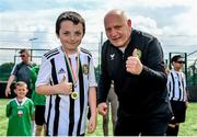 18 June 2023; FAI President Gerry McAnaney presents medals to players after the Football For All National Blitz on the Sport Ireland Campus in Dublin. Photo by Seb Daly/Sportsfile