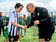 18 June 2023; FAI President Gerry McAnaney presents medals to players after the Football For All National Blitz on the Sport Ireland Campus in Dublin. Photo by Seb Daly/Sportsfile