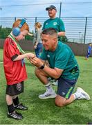 18 June 2023; FAI regional development officer Marc Kenny presents medals to players after the Football For All National Blitz on the Sport Ireland Campus in Dublin. Photo by Seb Daly/Sportsfile